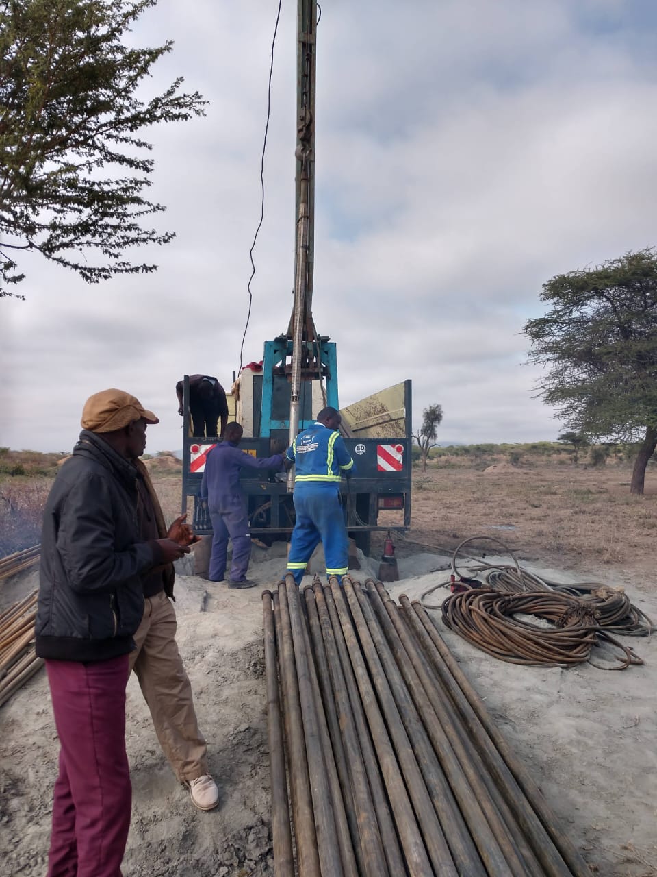 Milimani technical crew conducting pump installation after successful pump testing
