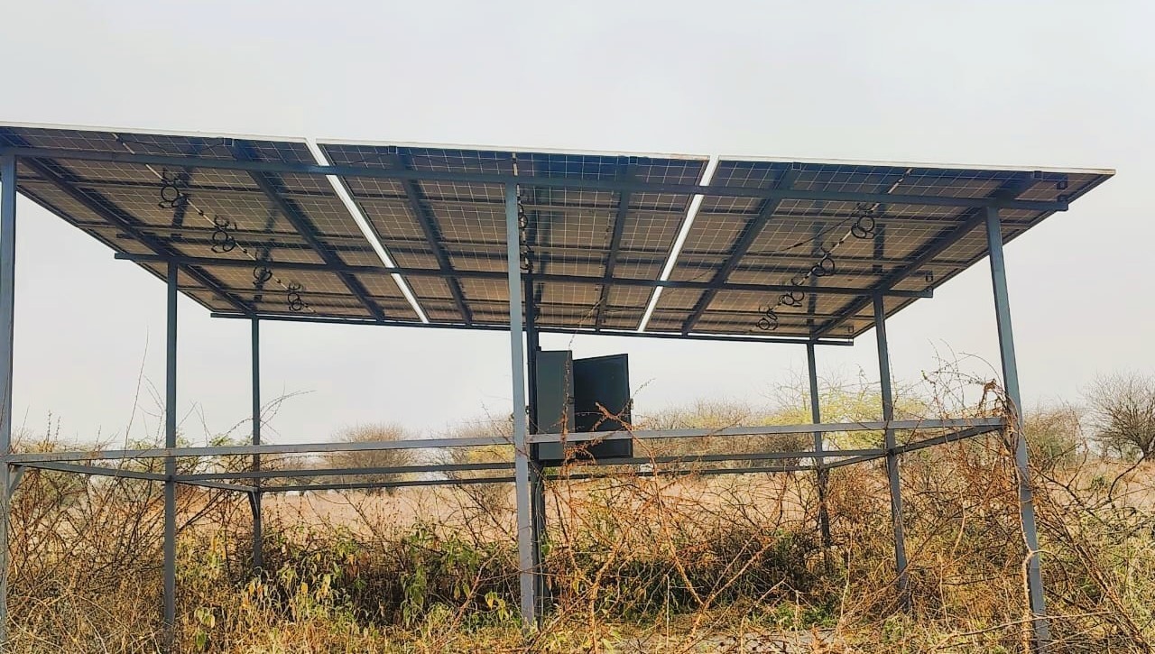 Solar-powered water system equipment installed in a rural field